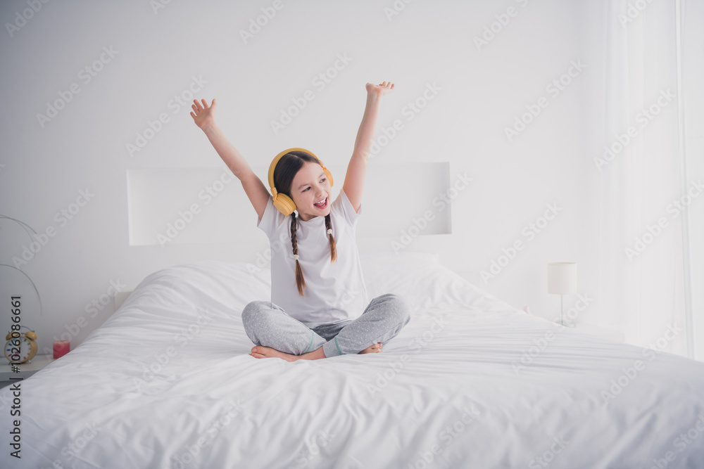 Portrait of cheerful carefree lovely girl celebrating weekend morning white light bedroom interior indoors Portrait of cheerful carefree lovely girl celebrating weekend morning white light bedroom interior indoors
