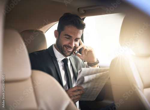 Businessman, newspaper and reading in car with mobile phone, style or pride in formal clothes. Male person, transport and commute in morning as professional in investment banking for travel or luxury