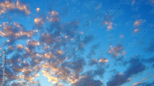 Altocumulus high cumulus heaped cloud genus that belongs mainly to stratocumuliform. Globular masses or rolls in layers or patches. Cumuliform stratocumuliform clouds, altocumulus signifies convection photo