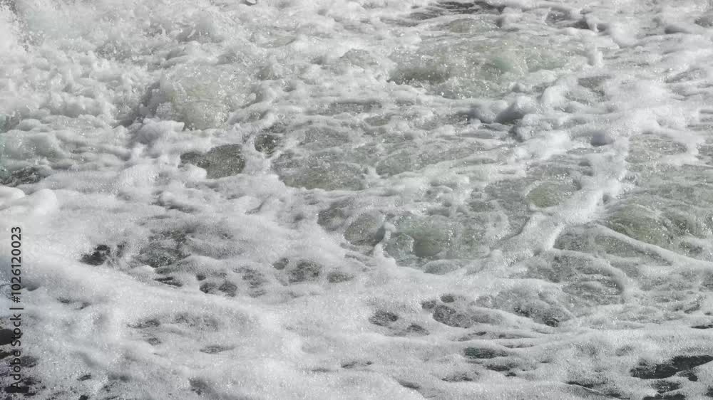 A stream of foamy, seething water towards the chamber A stream of foamy, seething water towards the chamber