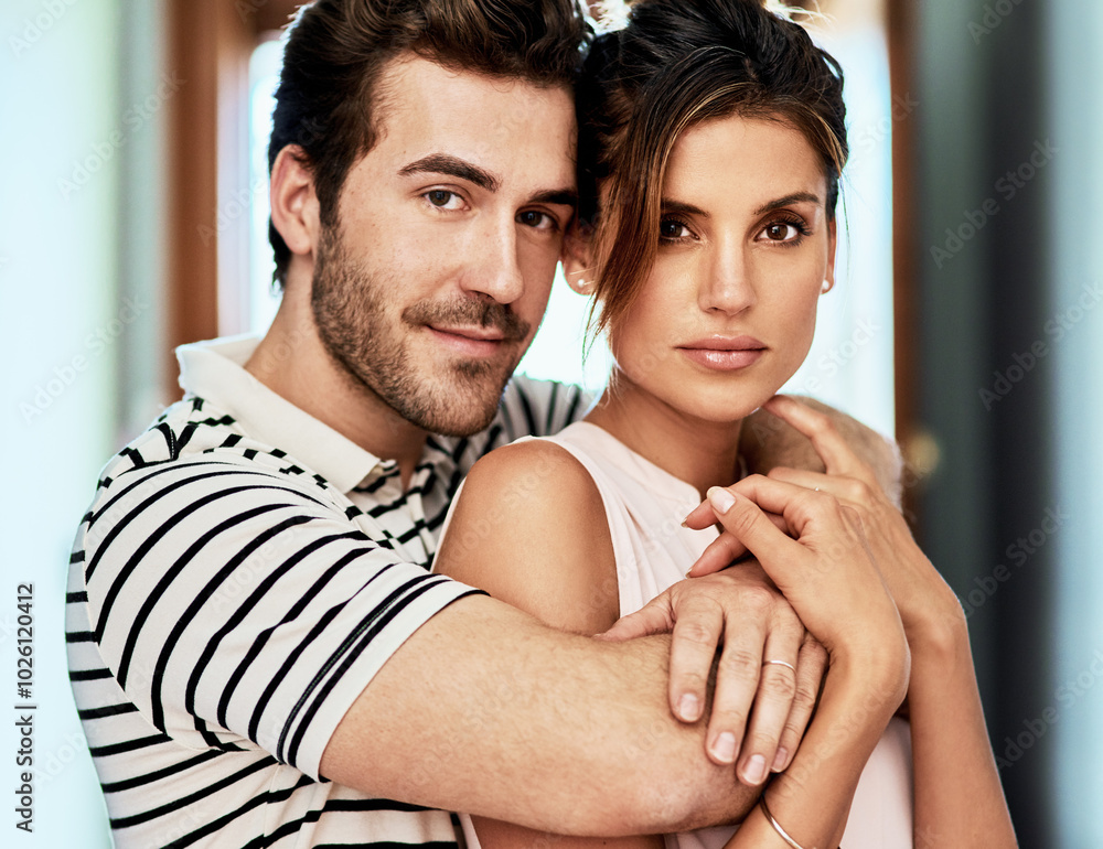 Fototapeta premium Loyalty, portrait and couple hug in home with trust and love for care, romance and bonding. Support, commitment and people embrace in marriage relationship together to relax in apartment in Italy