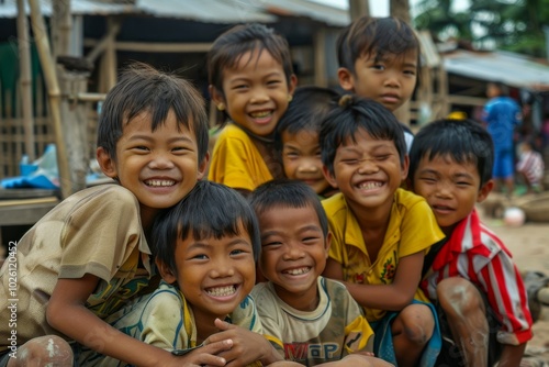 Group of asian children smiling at the camera.