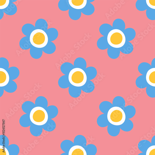 Seamless pattern with blue daisy flowers on pastel pink background. Cute childish style. Minimalist background for textile, fabrics, baby clothes, wallpapers