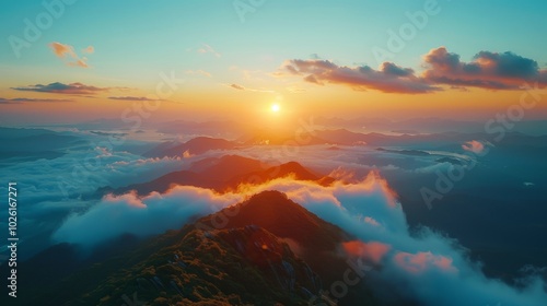 Sunset Over Mountain Range With Clouds