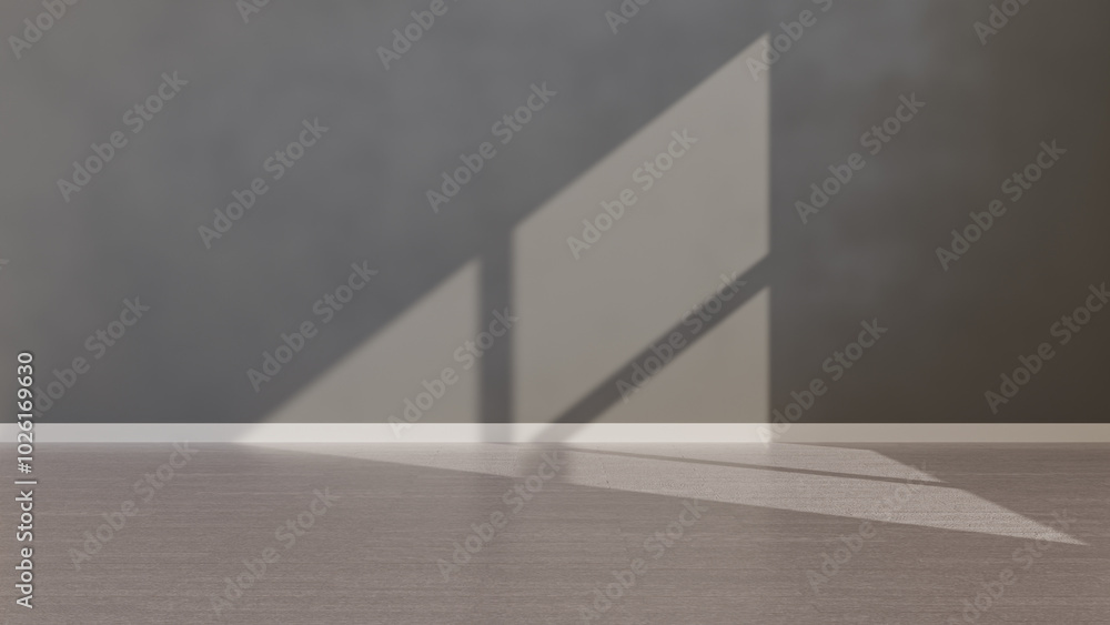 Gray wall illuminated by natural light. Rays of sunlight create a minimalist and cozy environment. Perfect for interior design and advertising projects. Gray wall illuminated by natural light. Rays of sunlight create a minimalist and cozy environment. Perfect for interior design and advertising projects.