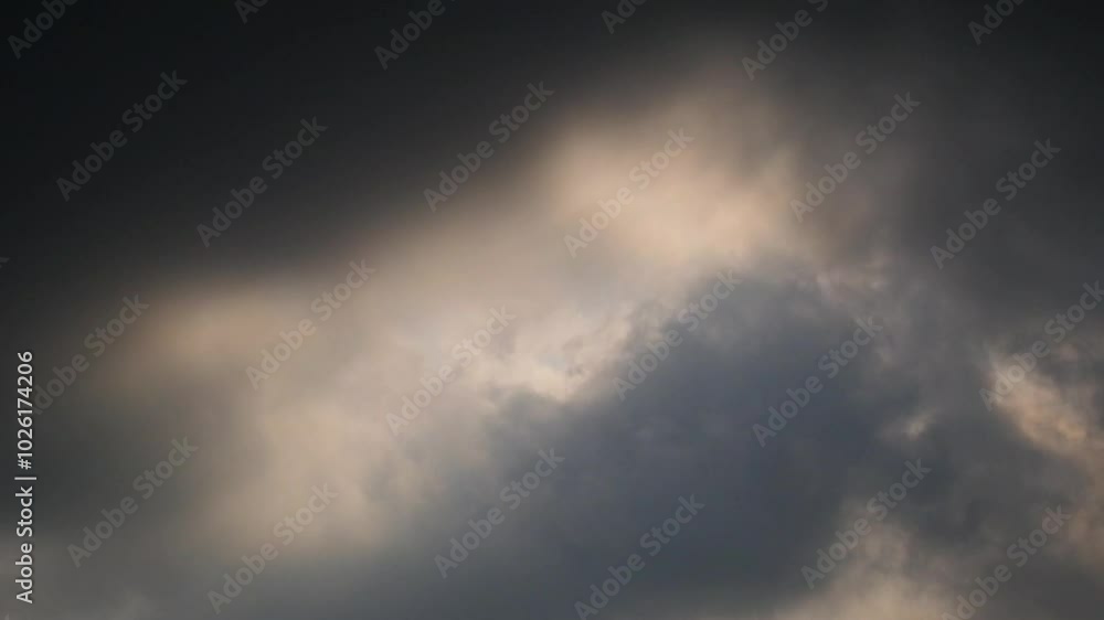 Timelapse of dramatic movement of dark clouds covering the sky. Rapid movement of clouds in the daytime sky. 4K, 60Fps footage can be used for slow motion Timelapse of dramatic movement of dark clouds covering the sky. Rapid movement of clouds in the daytime sky. 4K, 60Fps footage can be used for slow motion
