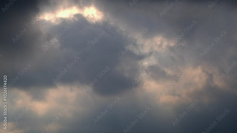 Timelapse of dramatic movement of dark clouds covering the sky. Rapid movement of clouds in the daytime sky. 4K, 60Fps footage can be used for slow motion Timelapse of dramatic movement of dark clouds covering the sky. Rapid movement of clouds in the daytime sky. 4K, 60Fps footage can be used for slow motion