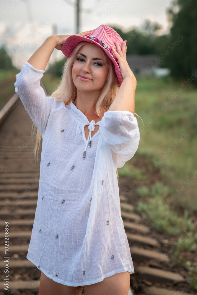 Portrait of a young beautiful blonde girl outdoors. Portrait of a young beautiful blonde girl outdoors.