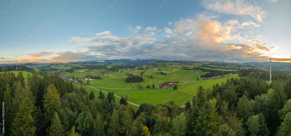 Obraz premium panoramic aerial photo near sunset in the Allgäu Alps next to village of Oberreute, Bavaria, Germany