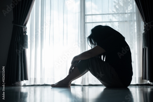 young woman sat alone, feeling weight of anxiety, stress, and depression, her sadness echoing struggles many people face in silence. anxiety, stress, depression, woman, person, sad, adult, alone.