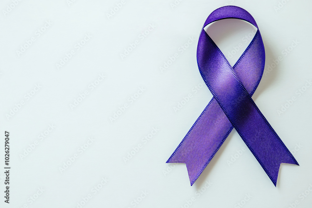 Purple ribbon on white background representing general cancer awareness, Alzheimer's disease, domestic violence awareness. Dementia diagnosis Old Age-related health mental health problems, memory loss Purple ribbon on white background representing general cancer awareness, Alzheimer's disease, domestic violence awareness. Dementia diagnosis Old Age-related health mental health problems, memory loss