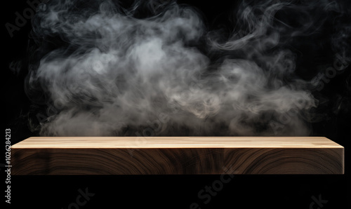 A food presentation table with smoke in the background