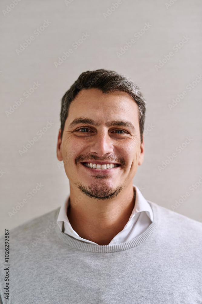 Fototapeta premium Business man, portrait and smile in office with confidence and happy from lawyer work and career. Professional, attorney and labour law firm with corporate style and fashion with employee from Sweden