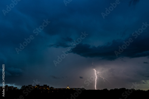 lightning flashes in the night sky
