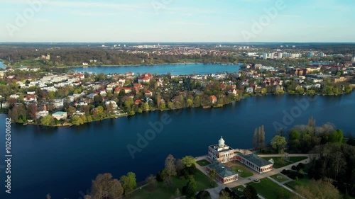 Aerial sink flight of Mamorpalais and lake Heiliger See in Potsdam, Germany photo