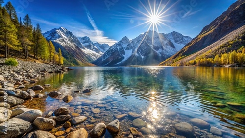 Fototapeta Naklejka Na Ścianę i Meble -  Mountain lake Shavlinskoye in Altai with stone shores and snowy mountains in the sun