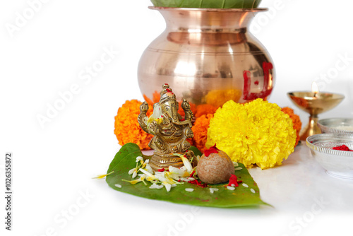 kalash pujan ganesha pujan Indian festival akshaya tritiya Decorative kalash with coconut and leaf with floral decoration photo