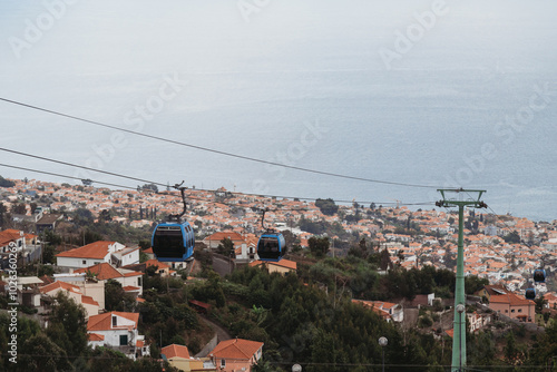 Cable car with cabins above the city Funchal, Madeira Island, Portugal