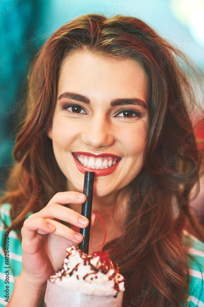 Happy girl, portrait and drinking with milkshake at diner for cold beverage, sweet or dessert. Young, attractive or female person with smile for smoothie or frappe at indoor restaurant or coffee shop Happy girl, portrait and drinking with milkshake at diner for cold beverage, sweet or dessert. Young, attractive or female person with smile for smoothie or frappe at indoor restaurant or coffee shop