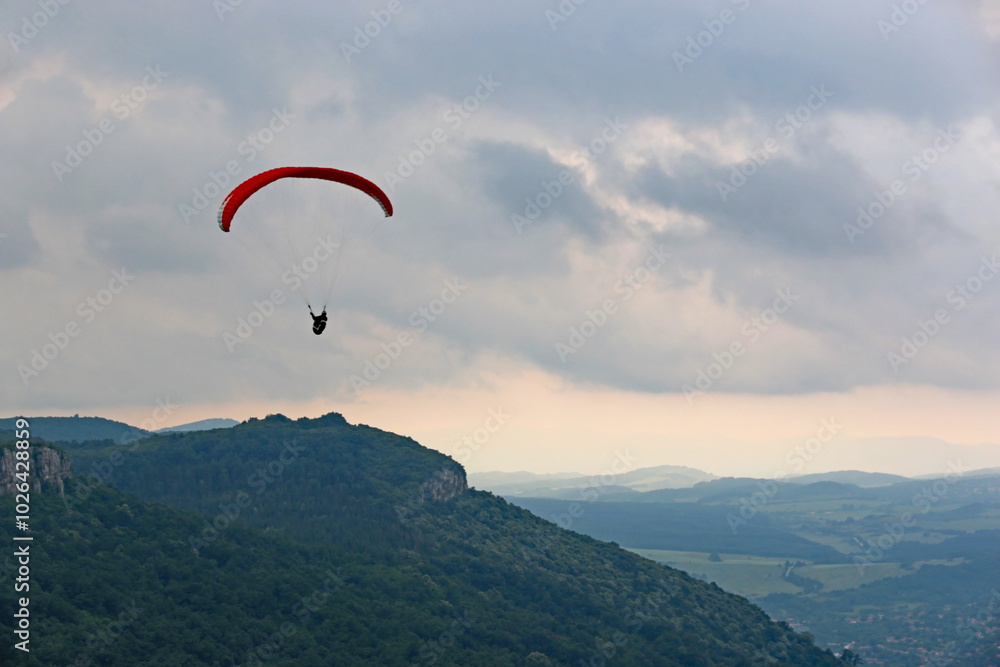 Paraglider flying in Central Bulgaria Paraglider flying in Central Bulgaria