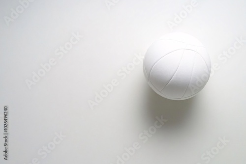 A white ball with a black line on it