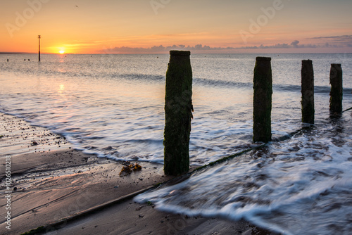 Teignmouth beach sunrise in summer, Devon, United Kingdom