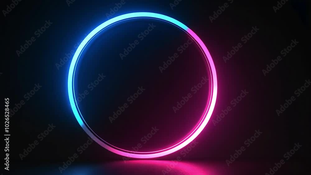 A glowing, neon blue and pink circle against a dark backdrop. A glowing, neon blue and pink circle against a dark backdrop.