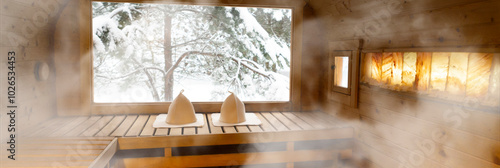 interior of a sauna with big window with snow trees outside