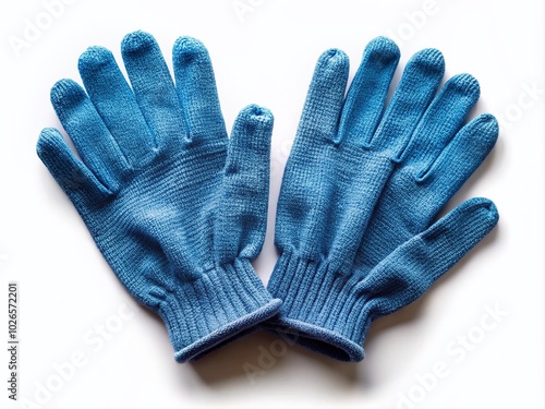 Classic blue textile worker gloves on display, perfect for handyman protective equipment photography, showcasing a vintage style ideal for safety and