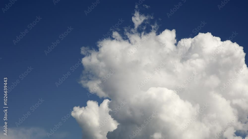 Expansive timelapse of dynamic clouds moving quickly on a sunny day, sky fills the frame Expansive timelapse of dynamic clouds moving quickly on a sunny day, sky fills the frame