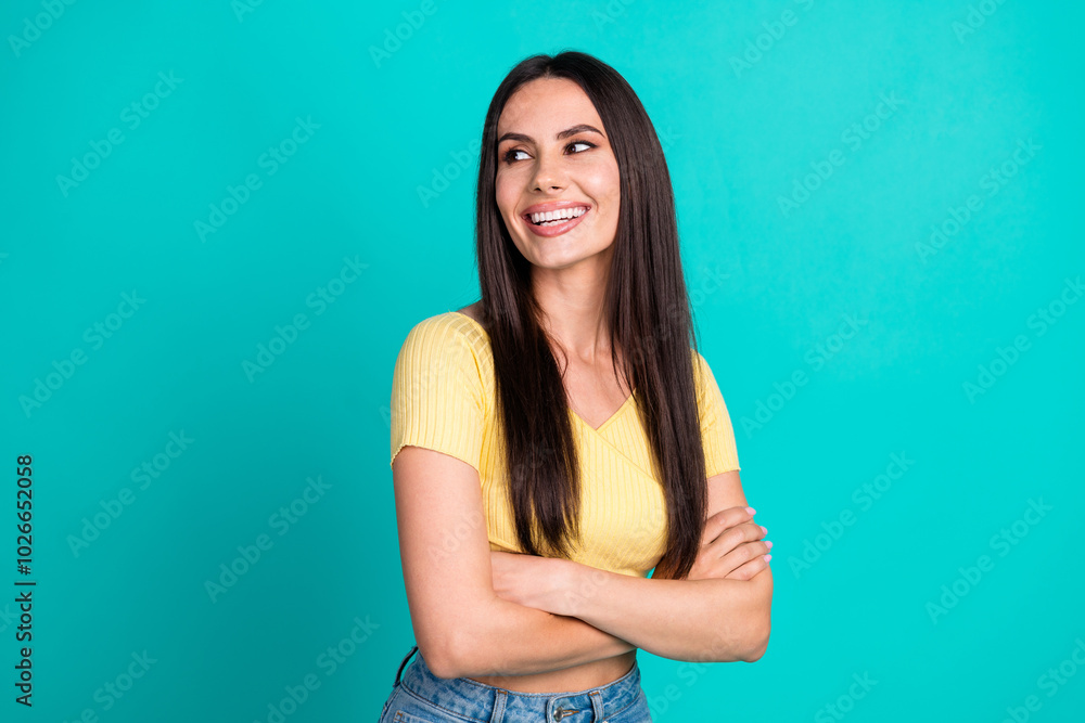 Photo of pretty young woman folded hands look empty space wear top isolated on teal color background Photo of pretty young woman folded hands look empty space wear top isolated on teal color background