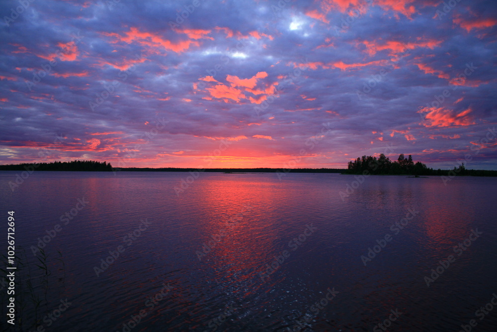 Purple and pink sunset over the lake Purple and pink sunset over the lake