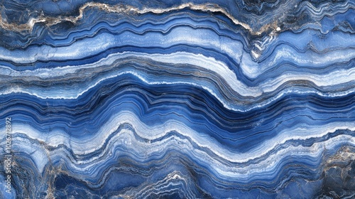 Abstract blue and white wavy pattern with gold veins.