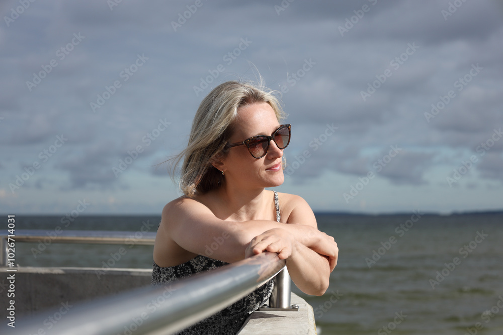 Beautiful woman enjoying summer outdoors Beautiful woman enjoying summer outdoors