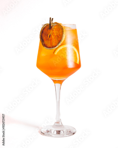 Orange drink with dehydrated orange slice garnish on a White Background.
