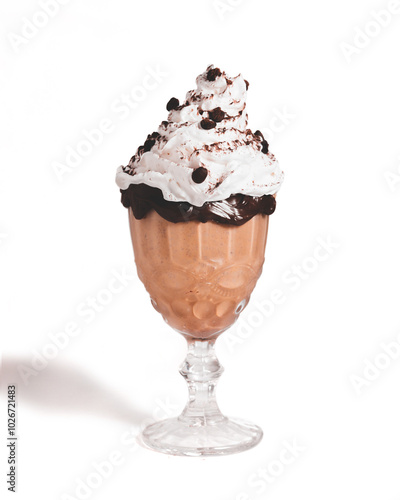 Coffee drink with cacao seeds, chocolate and chantilly on a white background.