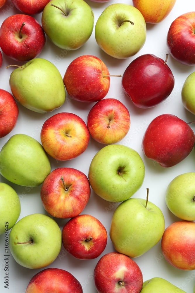 Many fresh apples on white background, flat lay Many fresh apples on white background, flat lay