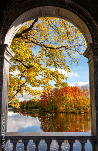 Grand pond of Catherine park in autumn seen from Marble bridge, Tsarskoe Selo (Pushkin), Saint Petersburg, Russia photo