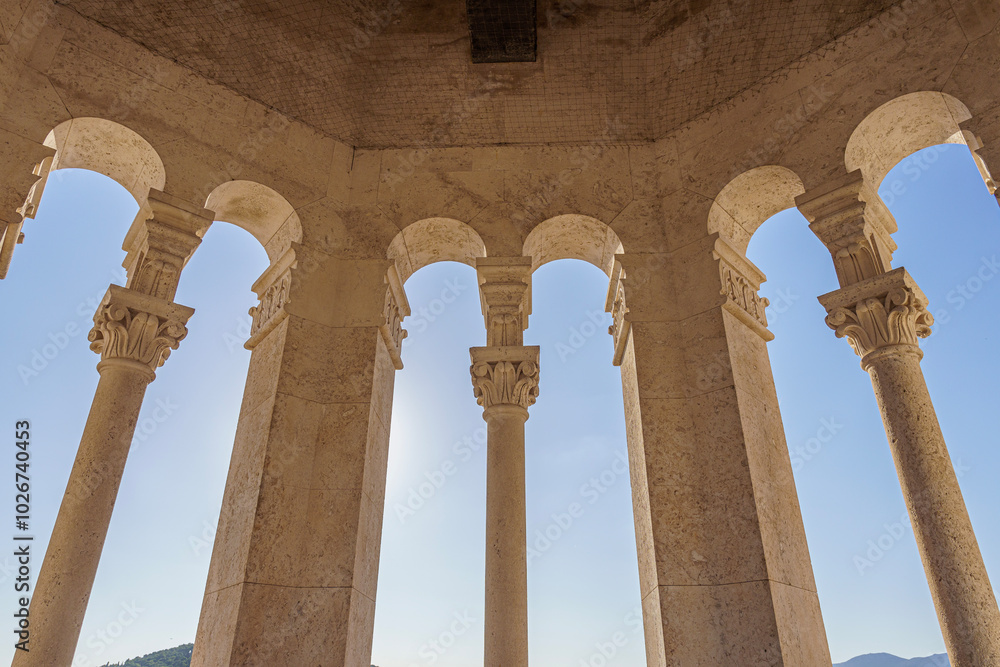 Saint Domnius bell tower arches with clear blue sky in background, backlit, Croatia, Split, wide angle lens Saint Domnius bell tower arches with clear blue sky in background, backlit, Croatia, Split, wide angle lens