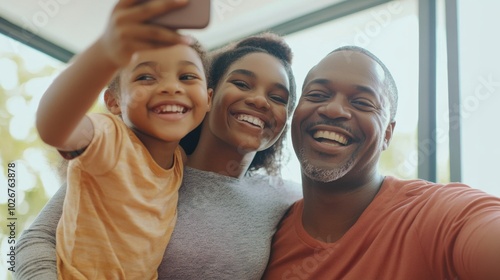 Father taking a selfie with his family in the morning at home, minimal background focusing on their happy expressions.