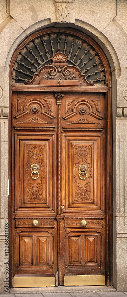 Close up view of a beautiful european wooden entrance door Close up view of a beautiful european wooden entrance door