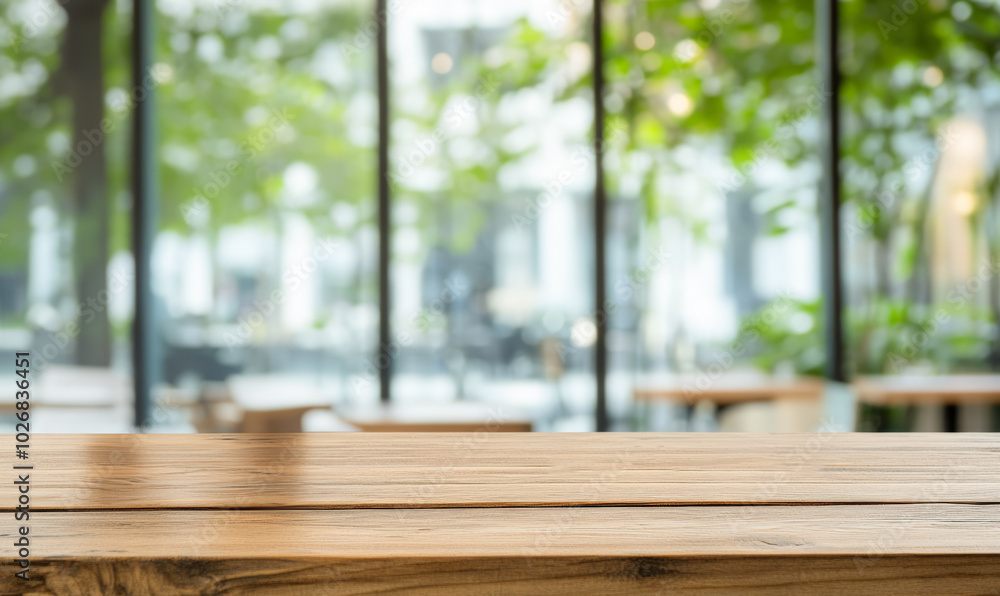 A wooden table with a view of a city street and a park A wooden table with a view of a city street and a park