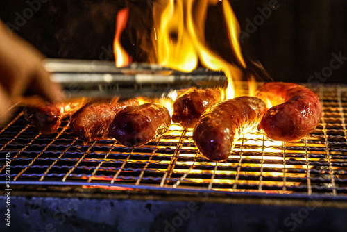 Tableau sur toile Grilled Sausages Over Open Flame