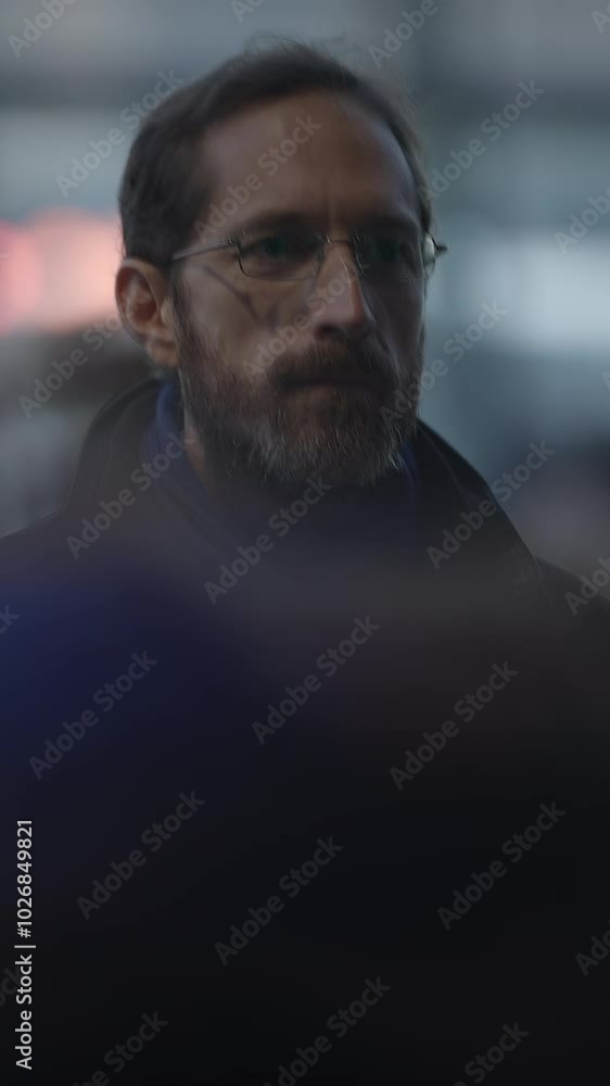 A Thoughtful Man Captured in a City Setting, Exuding Contemplation and Style Despite the Elements A Thoughtful Man Captured in a City Setting, Exuding Contemplation and Style Despite the Elements