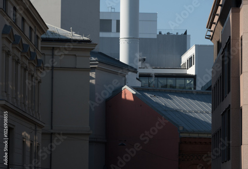 Looking at sunrise highlights on buildings near Rozenkrantz  gate and Karl Johans gate - 2 photo