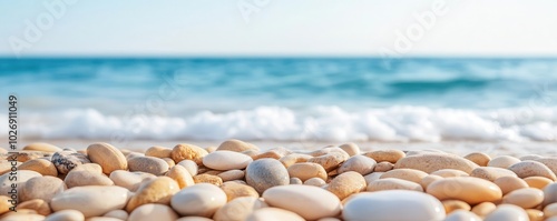 Slow waves washing over smooth pebbles on the shore close up Rhythmic sound for relaxation tranquil Overlay Beach backdrop