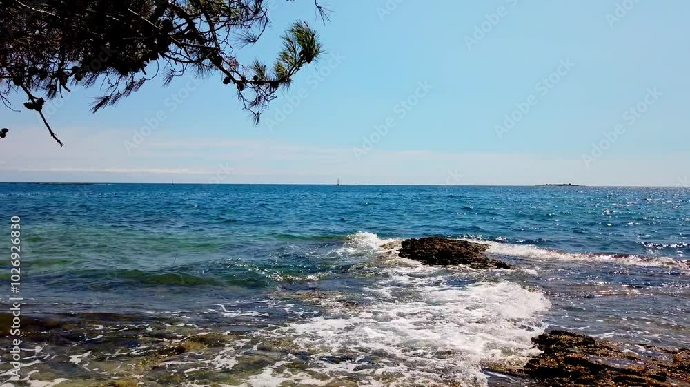 Coastal Serenity Experience the Tranquil Waters andthe Beautiful Rocky Shoreline Coastal Serenity Experience the Tranquil Waters andthe Beautiful Rocky Shoreline