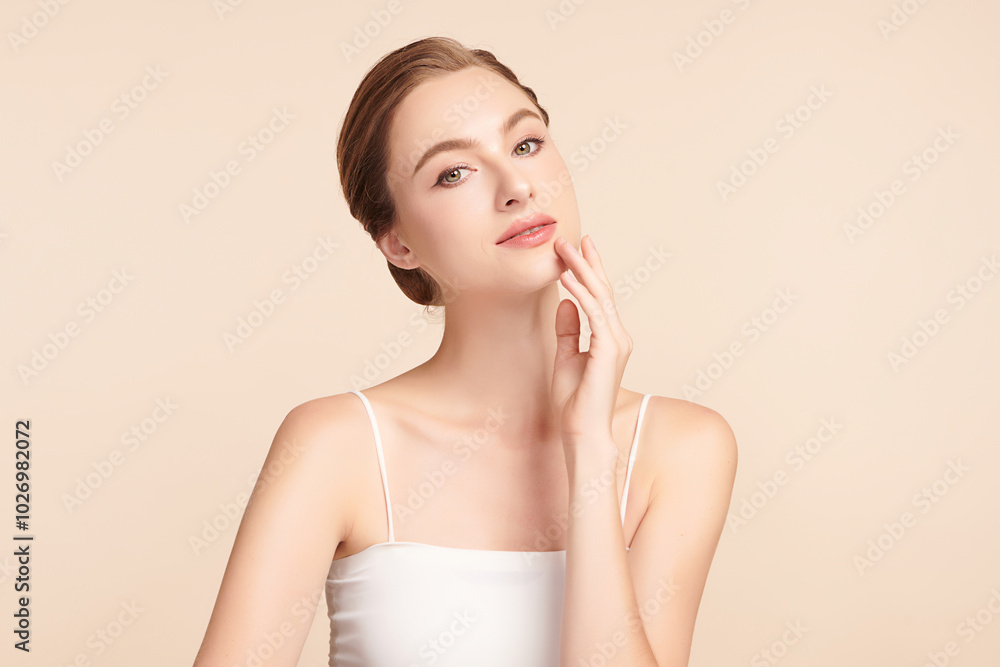 Beautiful young woman with clean fresh skin on beige background, Face care, Facial treatment, Cosmetology, beauty and spa, women portrait. Beautiful young woman with clean fresh skin on beige background, Face care, Facial treatment, Cosmetology, beauty and spa, women portrait.