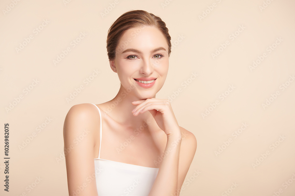 Beautiful young woman with clean fresh skin on beige background, Face care, Facial treatment, Cosmetology, beauty and spa, women portrait. Beautiful young woman with clean fresh skin on beige background, Face care, Facial treatment, Cosmetology, beauty and spa, women portrait.