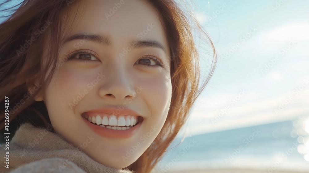 Joyful woman enjoying a sunny beach day for spring marketing campaigns Joyful woman enjoying a sunny beach day for spring marketing campaigns